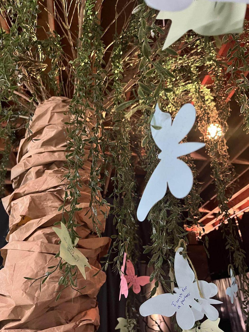 Paper fairies and wishes in the branches