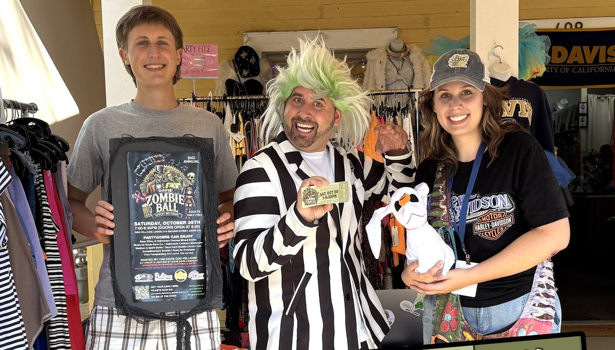 The Bohème crew in the shop with the Zombie Ball poster